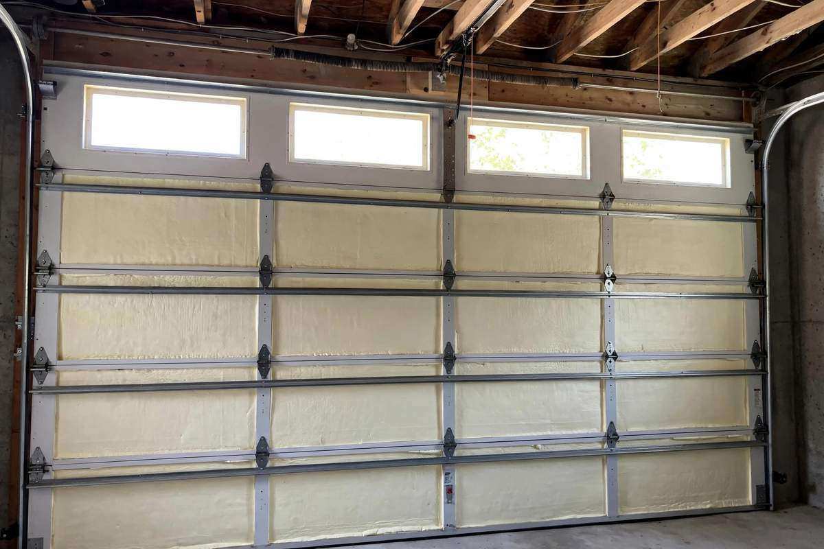 Insulated sectional garage door panels